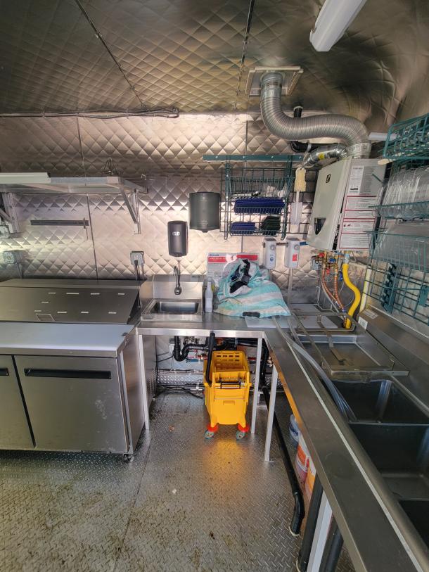 2021 24' Quality Trailer, high-capacity electric kitchen, stainless steel interior, commercial appliances, excellent condition.