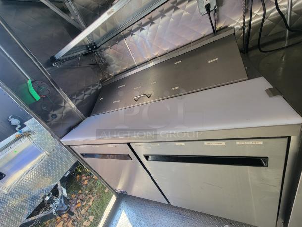 2021 Quality 24' trailer interior, with stainless steel commercial-grade electric kitchen equipment, labeled sections.