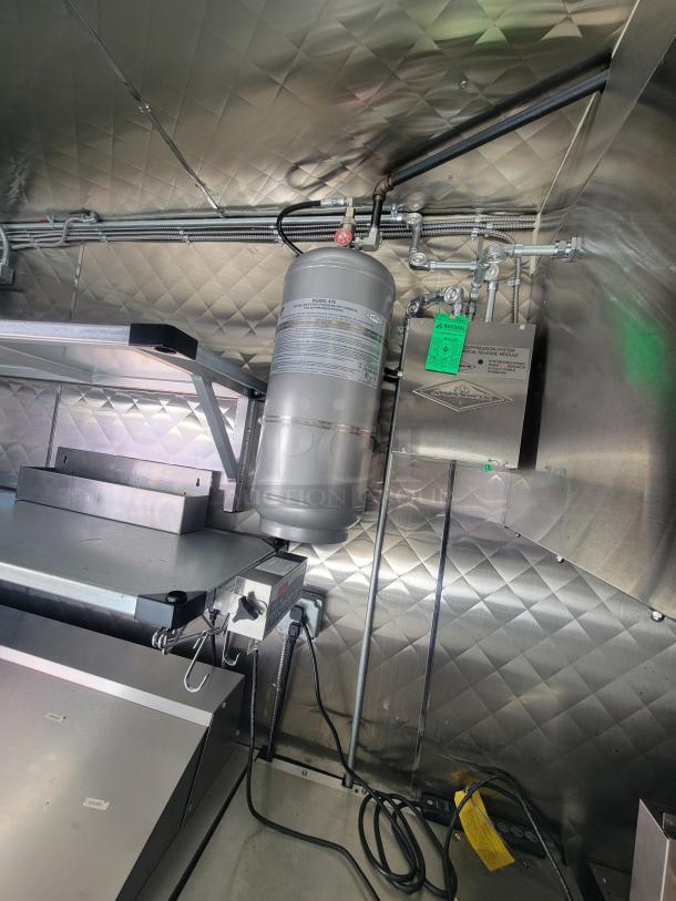 2021 Quality 24' trailer, featuring high-capacity electric kitchen appliances, stainless interior, excellent condition.