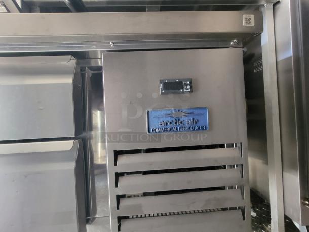 2021 Quality 24' Trailer with Arctic Air commercial refrigerator, stainless finish. High-capacity electric kitchen, like-new condition.