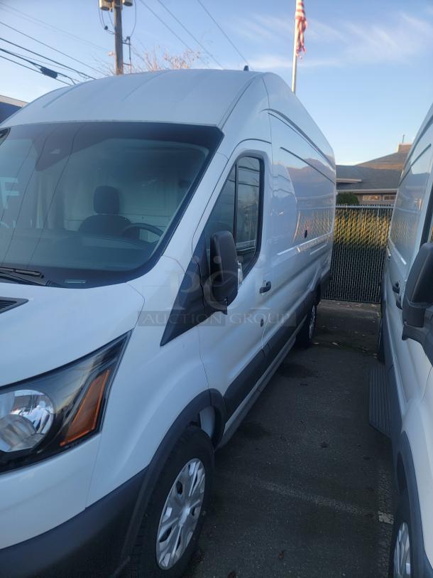 2020 Ford Transit 350 Cargo Van, high roof, low 2,212 miles, 148-inch wheelbase, SRW, clean cargo area, white exterior.