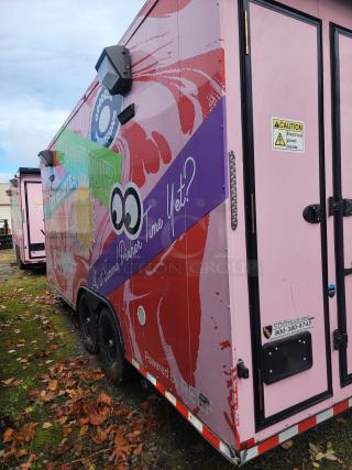 2021 SDG 8.5' x 20' food concession trailer with eye-catching wrap. Features tandem axles, caution sign, and SDG branding.