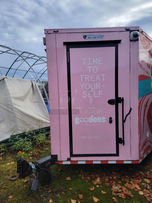 Pink 2021 SDG 8.5' x 20' ice cream concession trailer with "Time to Treat Yourself" slogan. Branded "goodees" with hitch.