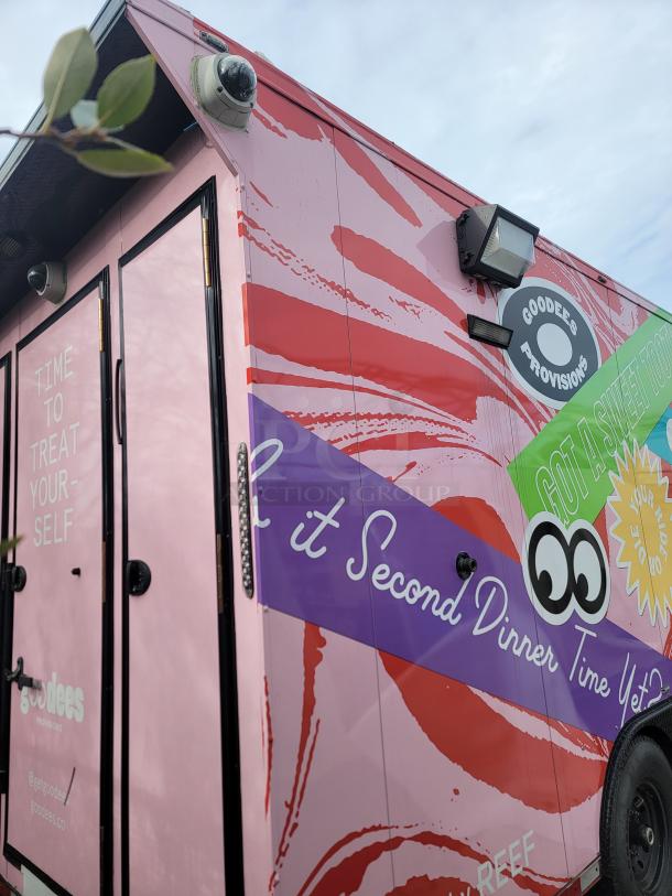 2021 SDG 8.5' x 20' Food Concession Trailer with colorful wrap, modern equipment, promoting desserts and frozen goods.