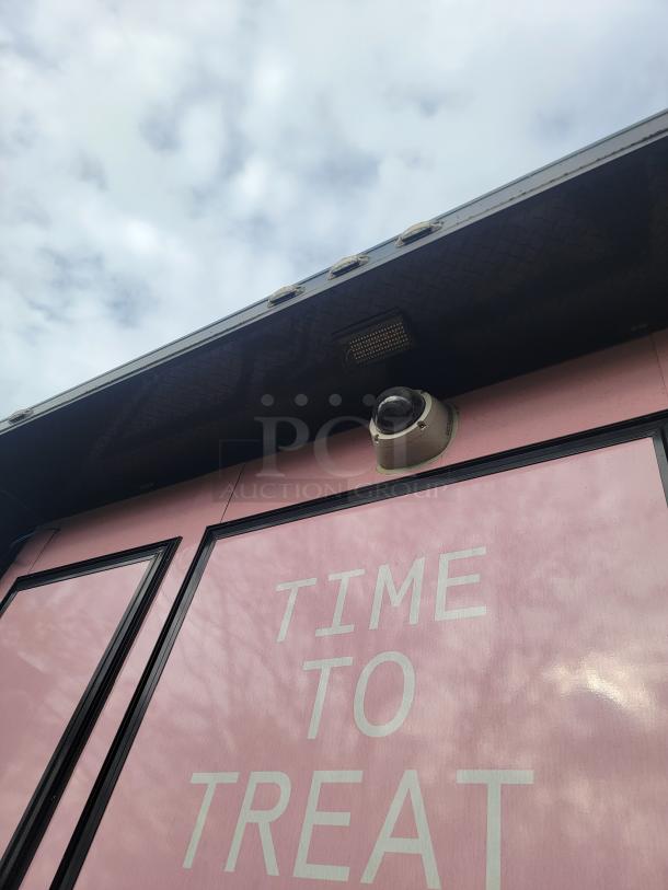 2021 SDG 8.5' x 20' food concession trailer with "Time to Treat" sign. Eye-catching wrap, ready for high-volume sales.