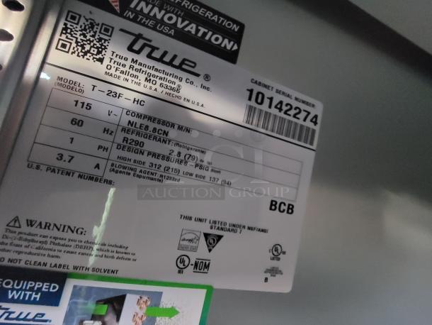True Refrigeration unit label, Model T-23F-HC. Features R290 refrigerant, 115V, 60Hz. Serial number 10142274.