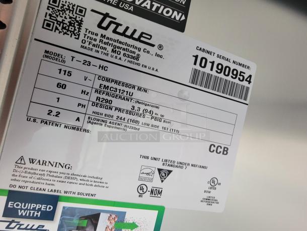 Label on True Refrigeration unit model T-23-HC. Details: Compressor EMC3121U, refrigerant R290, cabinet serial 10190954.