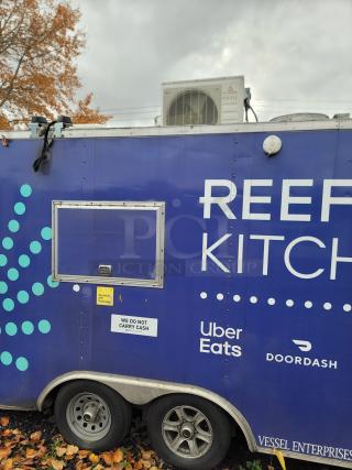 2019 Rock Solid Cargo 24' commercial food trailer with REEF Kitchens branding, fitted with HVAC unit and safety signage.