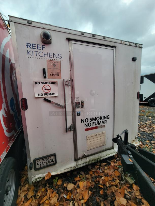 2019 Rock Solid 24' commercial food trailer with REEF Kitchens branding, no smoking sign, Texas license plate.