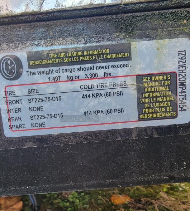 Label on 2021 Quality 16-Foot Kitchen Vessel shows tire and loading info, VIN: 1Z9Z1EH20MP475454, max load 3,300 lbs.