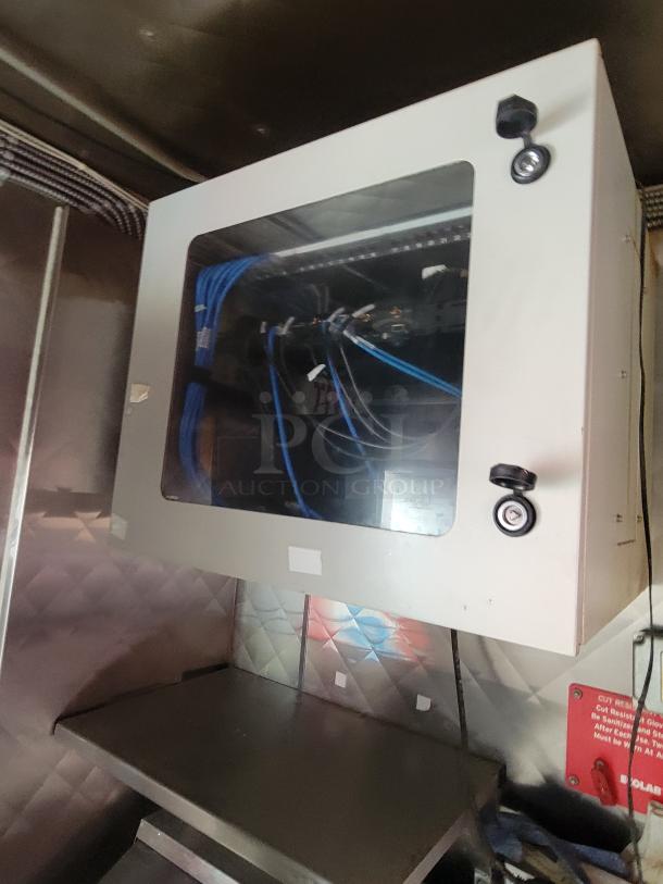 16-foot commercial kitchen vessel by Quality, Model 16. Features include dual-axle setup and wiring panel. Built in 2021.