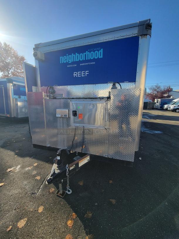 2020 Quality 24' Food Trailer, fully equipped, "Neighborhood Kitchens" branding, ready for high-volume operations.