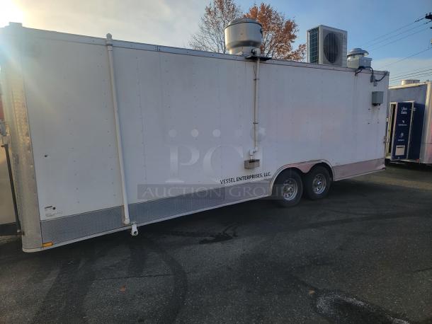 2019 Quality 24' food concession trailer with commercial kitchen; heavy-duty tandem axle frame; labeled "VESSEL ENTERPRISES, LLC."