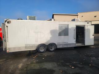 2019 Quality 24' food concession trailer, fully equipped kitchen, tandem axle, open door revealing interior, Vessel Enterprises LLC marking.