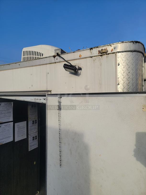 2019 Quality 24' Food Concession Trailer, visible exterior ceiling and side, white finish, and metal trim.