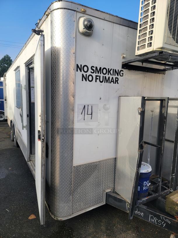 2019 Quality 24' food concession trailer, commercial kitchen, "No Smoking" sign, number 14, visible VIN 50ZZ1E427KN012854.