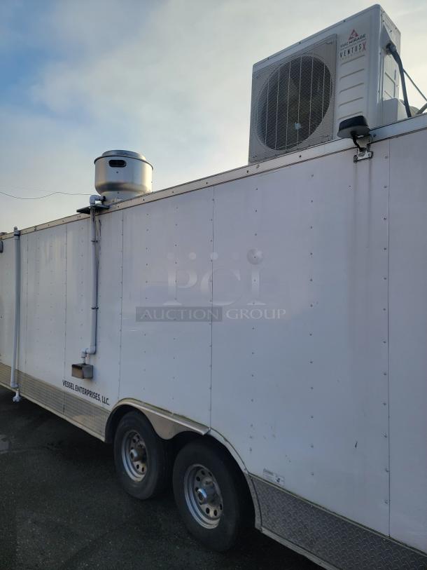 2019 Quality 24' food concession trailer with HVAC unit on top. Features durable tandem axle frame. In good condition.