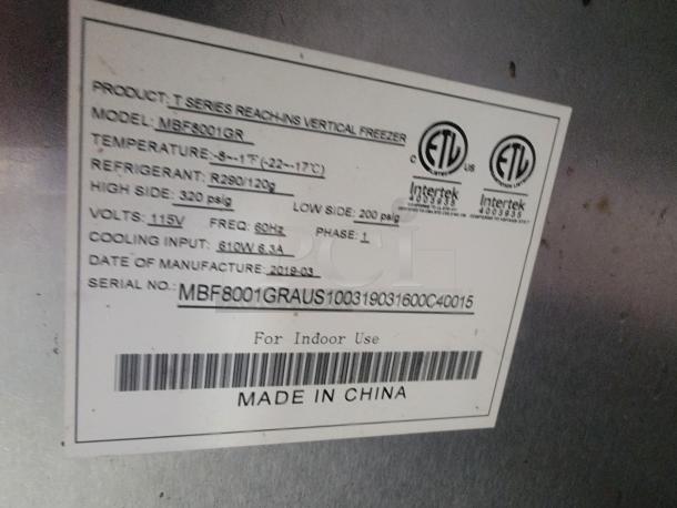 Label on vertical freezer, model MBF8001GR, made in China, 2019. Details: temperature, refrigerant, volts, input.