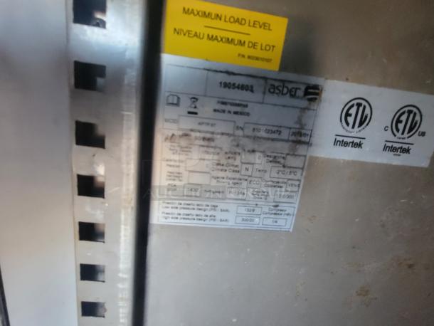 Label on equipment showing specifications, including serial number 0101623472, year 2019, temperature 2°C/5°C. ETL Intertek certified.