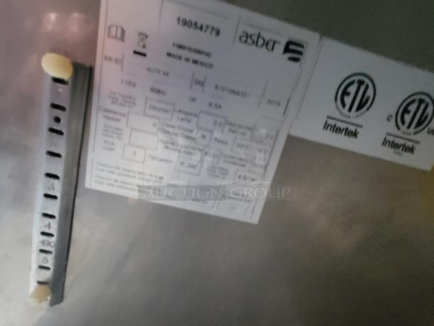 Label on food concession trailer wall, displaying technical specs, certifications from Asber and Intertek, model 2019, 115V.