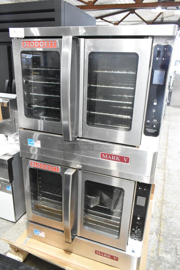 Blodgett MARK-V-100 stainless steel convection ovens with view doors, metal racks, and casters. 208V, 3 phase.