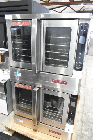 Blodgett MARK-V-100 stainless steel convection ovens with view doors, metal racks, and casters. 208V, 3 phase.