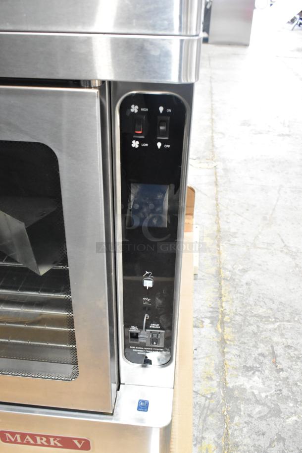 Blodgett MARK-V-100 stainless steel convection oven with view-through doors, metal racks, controls visible, 208V, 3-phase.