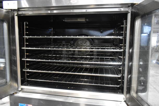 Blodgett MARK-V-100 commercial convection oven, stainless steel, view-through doors, metal racks, on casters, 208V, 3-phase.