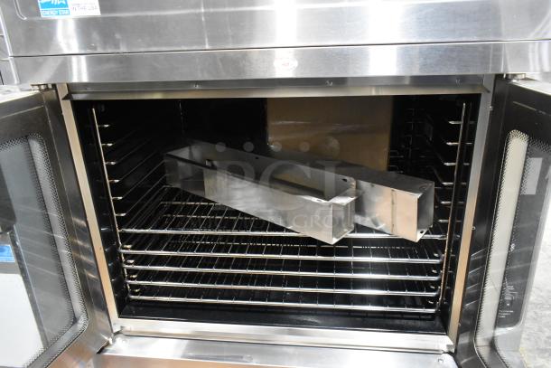 Blodgett MARK-V-100 stainless steel convection oven, view-through doors, metal racks, commercial casters, 208V, 3 phase.