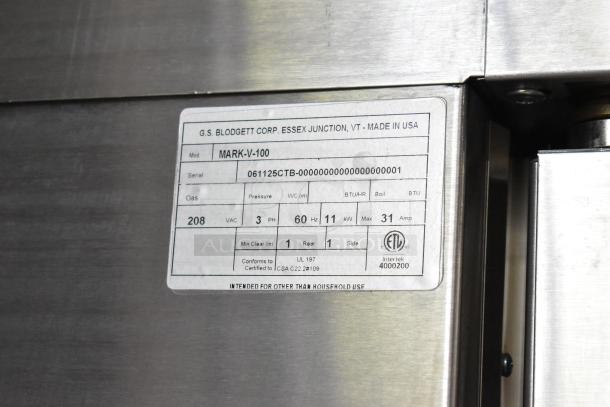 Blodgett MARK-V-100 stainless steel convection oven label showing model and specifications. 208V, 3 phase, 11kW, 31A.