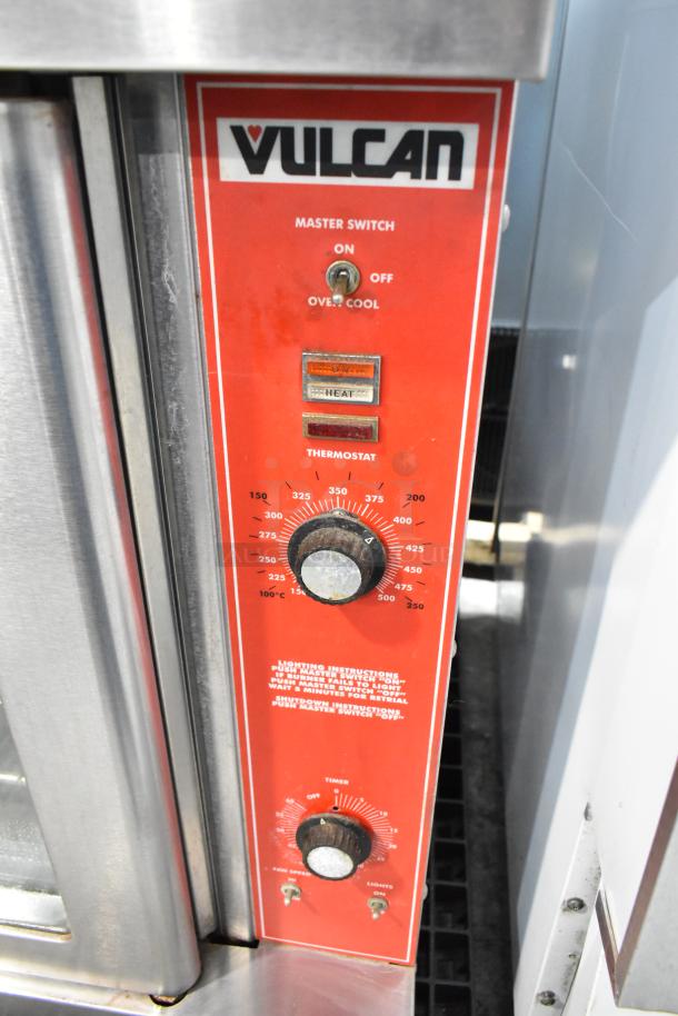 Vulcan VC6GD convection oven control panel with visible brand logo, thermostat, and settings for temperature and fan speed.