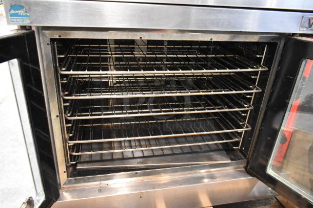 Vulcan VC6GD-SEFCAM stainless steel convection oven, view-through doors, metal racks, thermostatic controls, good condition.