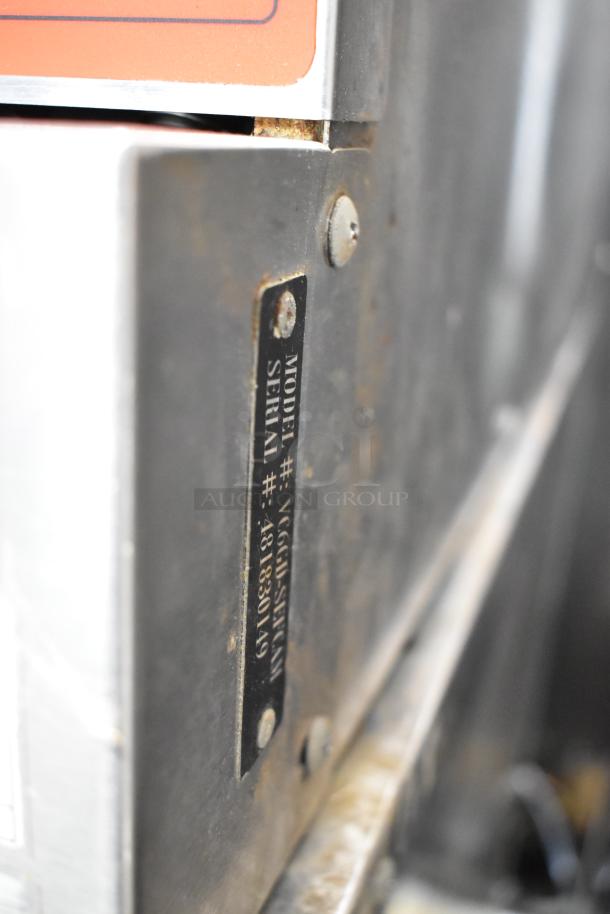 Vulcan VC6GD-SEFCAM stainless steel convection oven with model and serial number plate visible.