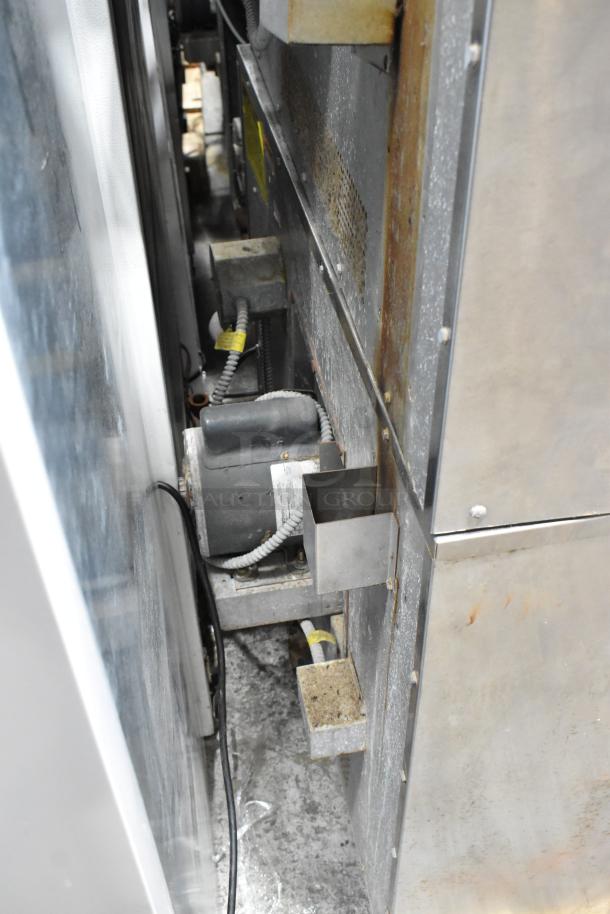 Vulcan VC6GD-SEFCAM convection oven, stainless steel, thermostatic controls, view-through doors. Shows electrical connections.