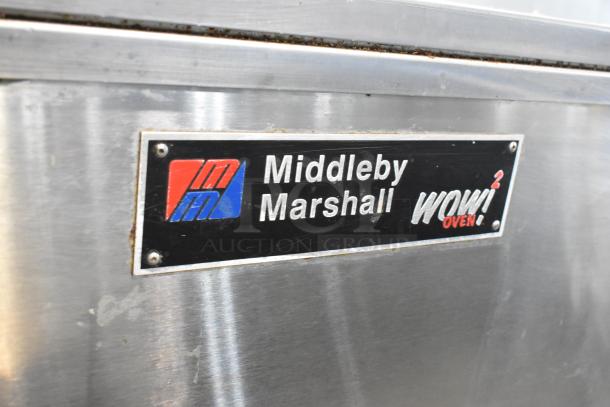 Middleby Marshall PS638G stainless steel commercial natural gas conveyor pizza ovens, 89,000 BTU, on casters.