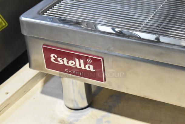 Estella ECEM2 commercial espresso machine, stainless steel, brand new scratch and dent, with logo and grill visible.