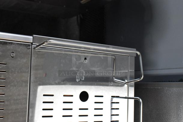 Estella ECEM2 stainless steel espresso machine, scratch and dent, two group, with 3 portafilters, steam wands.