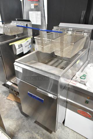 Brand new Imperial IFS-75 stainless steel commercial gas fryer, 175,000 BTU, with 2 metal baskets, visible minor scratches.