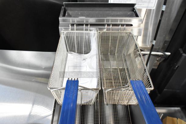 Brand new Imperial IFS-50 stainless steel commercial fryer with 2 metal baskets, 140,000 BTU, natural gas powered.