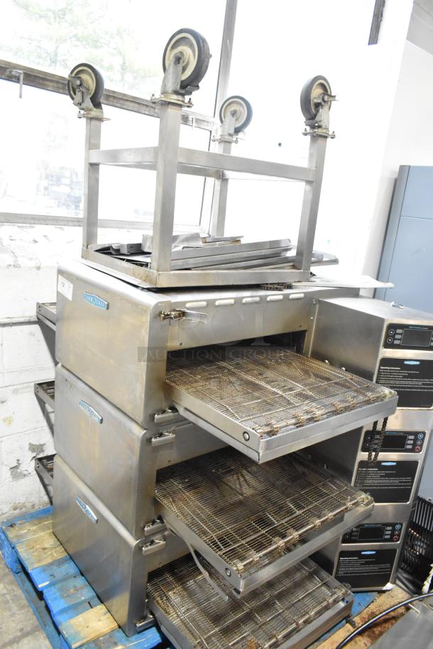 Turbochef HhC2020 stainless steel conveyor ovens, electric, 208/240V, 3-phase, with stand and commercial casters.