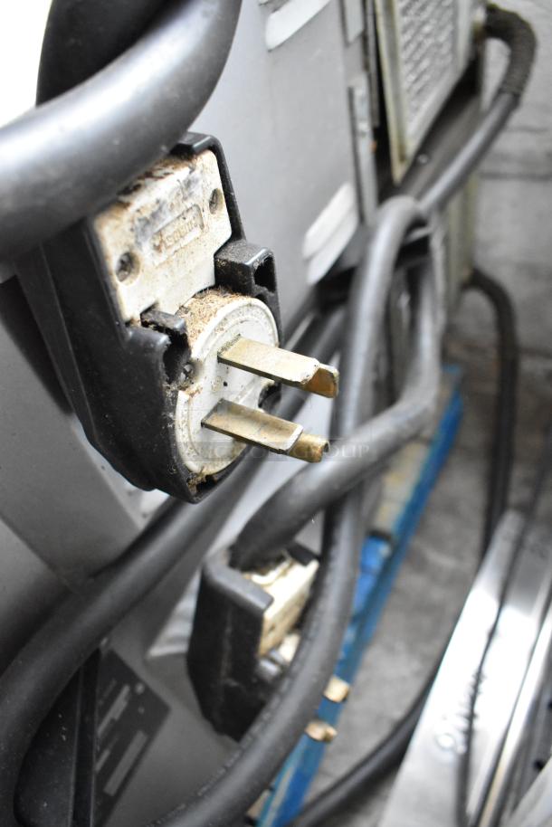 Turbochef HhC2020 plug and power cords, showcasing electrical connections for rapid cook conveyor oven.