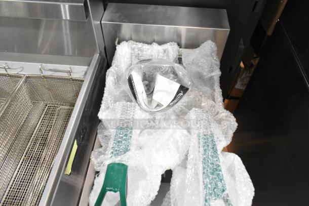 Brand new 2024 Avantco 177EF40B stainless steel electric fryer with 2 metal baskets, wrapped in bubble wrap, minor scratches.