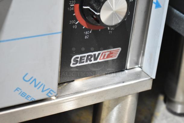 Alt text: ServIt 423WDNFS1 stainless steel drawer warmer, brand new with minor scratches, shows control panel and logo.