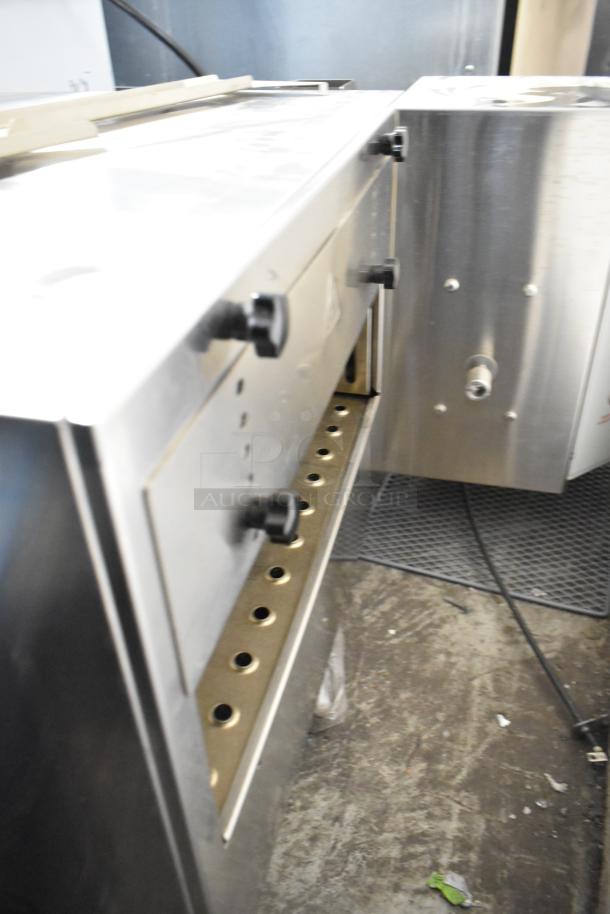 BRAND NEW Cooking Performance Group CPG 351ICOED stainless steel commercial electric pizza oven, 240V, 1 phase, no belt.