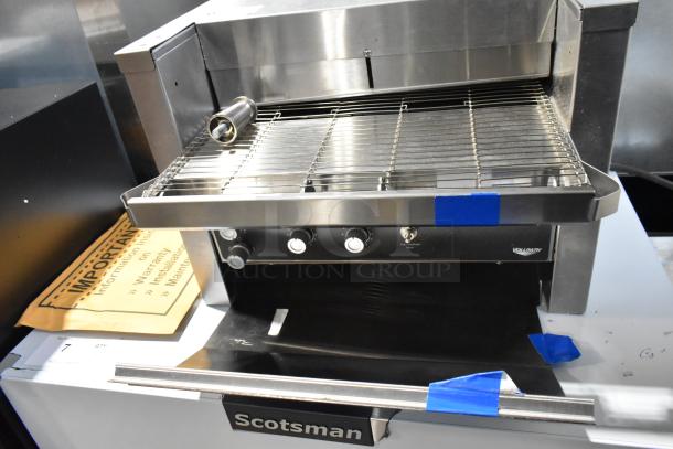 Brand new Vollrath JT2000 stainless steel commercial conveyor toaster with 1 1/2" opening, 240V, 1 phase, slight scratches.