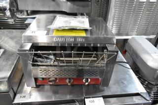 Brand new Avantco 184T3600D stainless steel conveyor toaster, 14.5" wide, 3" opening, 1200 slices/hr. "Caution Hot" label.