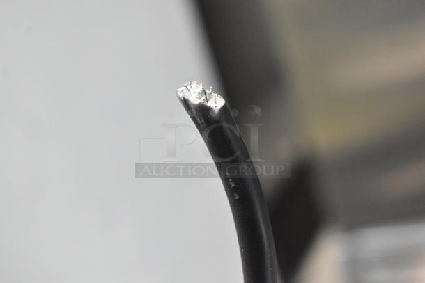 Damaged power cord of Avantco 177MG22R commercial meat grinder, intended function 110V, visible wire fraying.