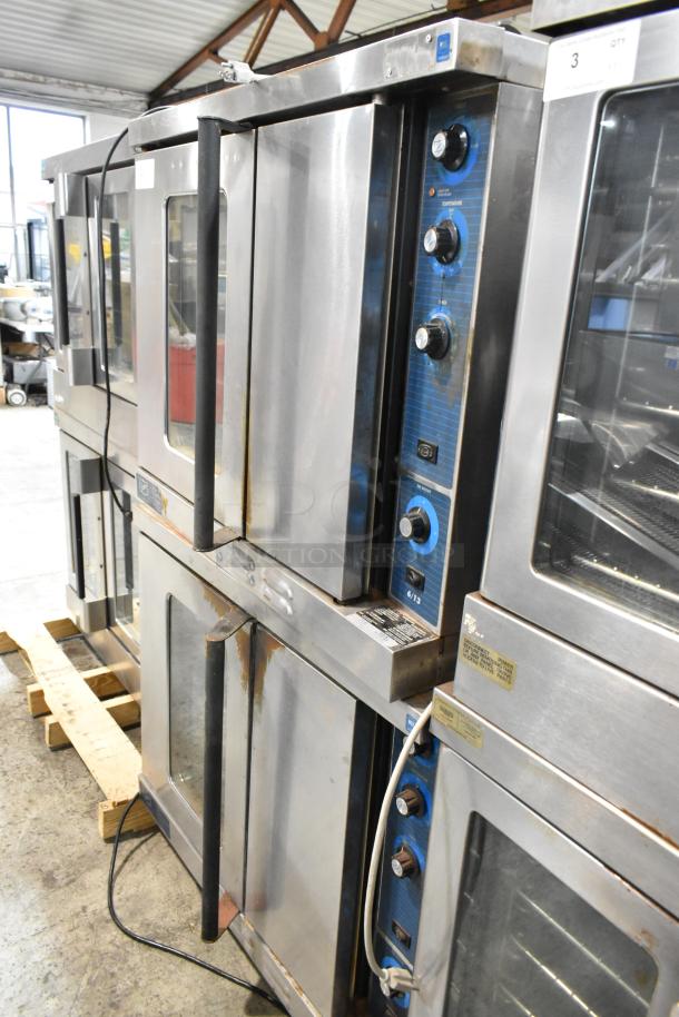 Duke 613-G2V stainless steel convection ovens with view-through doors, solid doors, metal racks, and thermostatic controls.