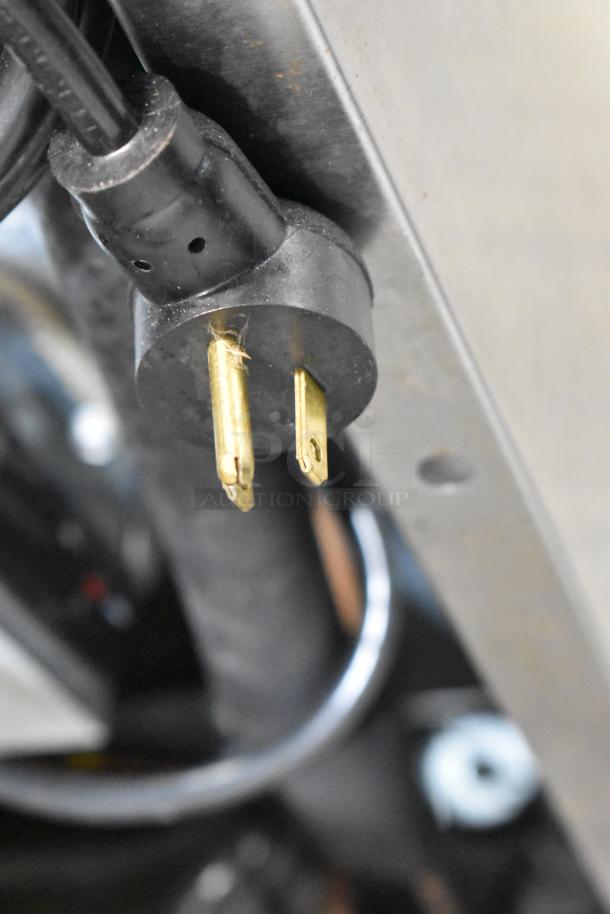 Plug of 2022 Delfield 406P-STAR2 stainless steel commercial cooler, 115 volts, 1 phase, showcasing power compatibility.