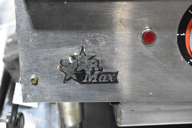 Star Max stainless steel commercial electric griddle, visible logo, red power indicator, used condition.